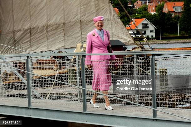 Queen Margrethe of Denmark on a footbridge at the Maritime Museum and Historical Shipyard during her visit on June 15, 2017 in Hobro, Denmark. The...