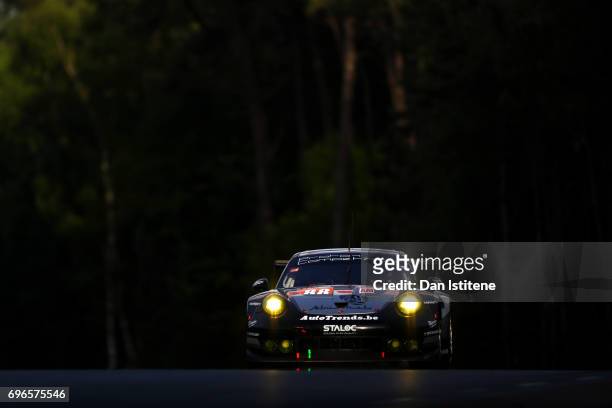 The Proton Competition Porsche 911 of Stephane Lemeret, Klaus Bachler and Khaled Al Qubaisi drives during qualifying for the Le Mans 24 Hour Race at...
