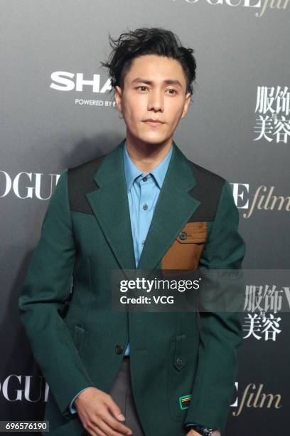 Actor Chen Kun arrives at the red carpet of 2017 Vogue Film gala on June 16, 2017 in Shanghai, China.