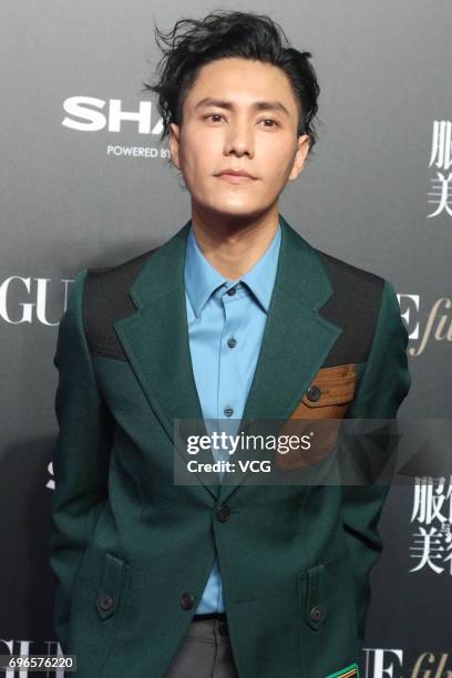 Actor Chen Kun arrives at the red carpet of 2017 Vogue Film gala on June 16, 2017 in Shanghai, China.