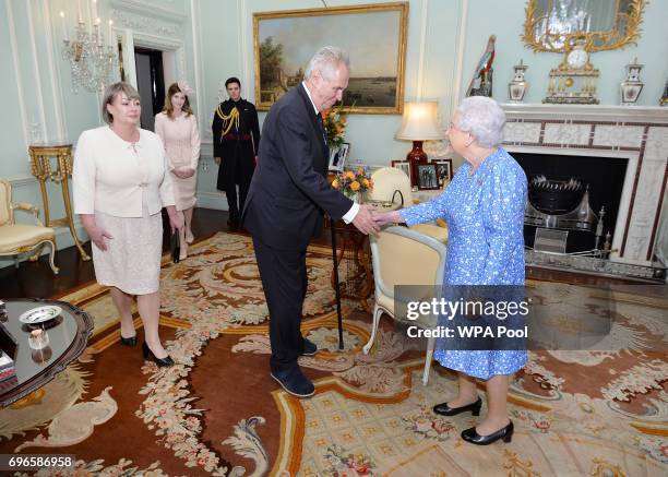 Queen Elizabeth II meets Milos Zeman, President of the Czech Republic, accompanied by his wife Ivana and daughter Katerina during a private audience...