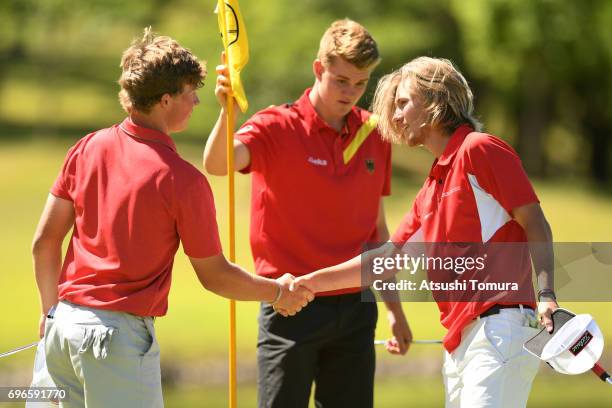 Frank Capan of the USA and Gustav Frimodt of Denmark shake hand during the final round of the 2017 TOYOTA Junior Golf World Cup at the Chukyo Golf...