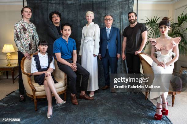 The cast of Okja are photographed for the Hollywood Reporter on May 22, 2017 in Cannes, France. From left to right: Paul Dano, Seo-Hyun Ahn, film...