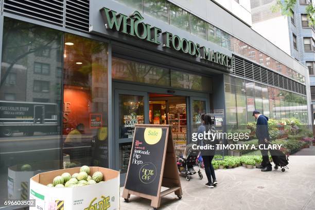 The Whole Foods Market in Midtown New York is seen on June 16, 2017. Amazon is once again shaking up the retail sector, with the announcement Friday...