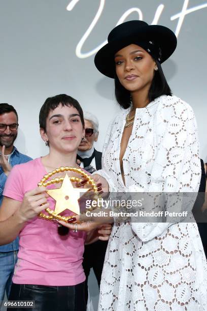 Singer Rihanna gives the price to the Winner of the "Young Fashion Designer" LVMH Prize 2017, Stylist Marine Serre during the "Young Fashion...