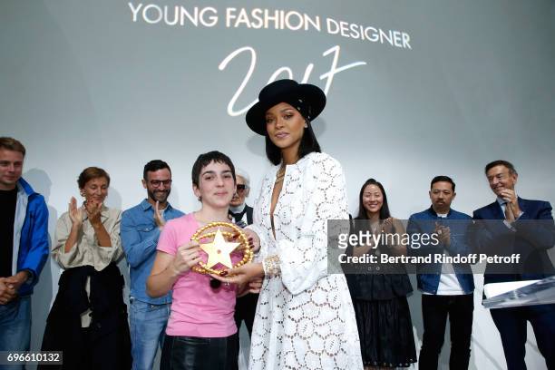 Singer Rihanna gives the price to the Winner of the "Young Fashion Designer" LVMH Prize 2017, Stylist Marine Serre during the "Young Fashion...