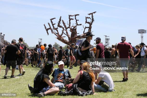 Festival goers attend the Hellfest heavy metal and hard rock music festival in Clisson on june 16, 2017. / AFP PHOTO / LUDOVIC MARIN