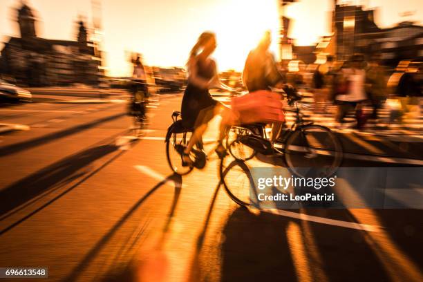 amsterdam crowded city street - amsterdam architecture stock pictures, royalty-free photos & images