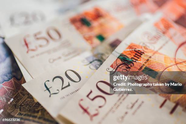 british pound banknotes - 50 pound notes stock pictures, royalty-free photos & images
