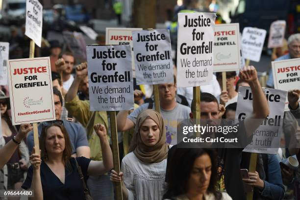 Protesters attend a rally calling for justice for those affected by the Grenfell Tower fire outside the Department for Communities & Local Government...