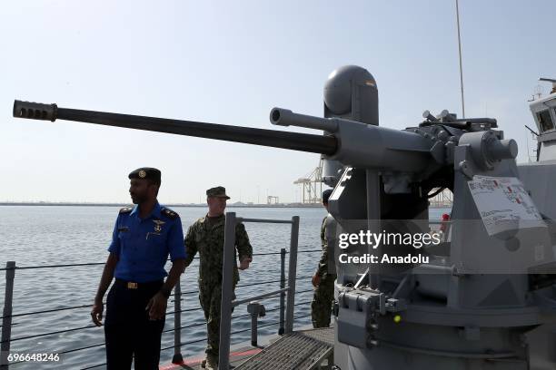 Soldiers are seen on the deck of a warship at Hamad Port in Doha, Qatar on June 16, 2017. After 12 billion dollars worth F-35 fighter jet agreement...