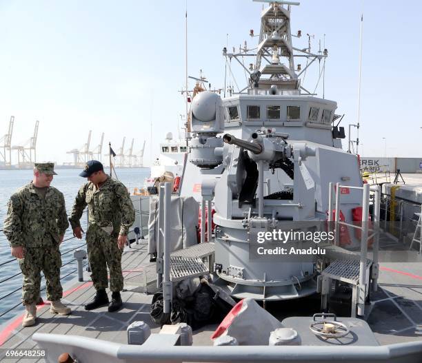 Soldiers are seen on the deck of a warship at Hamad Port in Doha, Qatar on June 16, 2017. After 12 billion dollars worth F-35 fighter jet agreement...