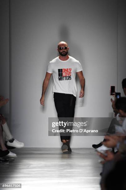 Fashion designer Milan Vukmirovic acknowledges the applause of the audience after the Ports 1961 show during Milan Men's Fashion Week Spring/Summer...