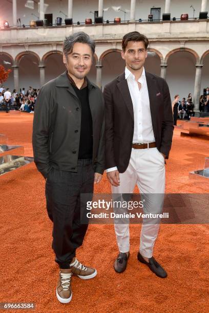 Johannes Huebl and Wu Xiubo attend the Ermenegildo Zegna show during Milan Men's Fashion Week Spring/Summer 2018 on June 16, 2017 in Milan, Italy.