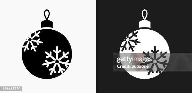 christmas ornament icon on black and white vector backgrounds - christmas bauble stock illustrations
