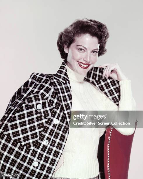 American actress Ava Gardner wearing a black and white checked jacket, circa 1960.