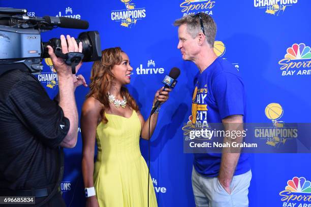 Reporter, Rosalyn Gold-Onwude interviews Steve Kerr of the Golden State Warriors during the Victory Parade and Rally on June 15, 2017 in Oakland,...