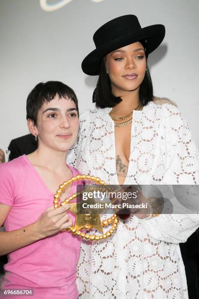 Winner of the 'Young Fashion Designer' LVMH Prize 2017, Stylist Marine Serre poses with singer Rihanna during the 'Young Fashion Designer' : LVMH...