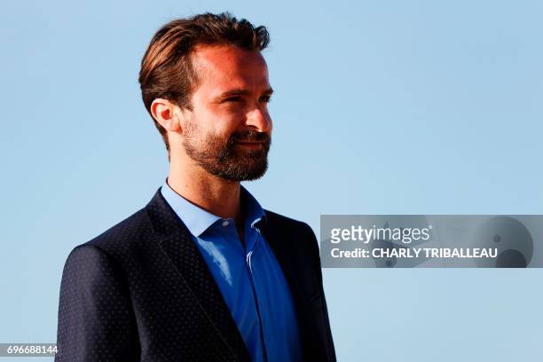 French actor Amaury de Crayencour poses on the red carpet on June 16, 2017 during the Cabourg Romantic Film Festival in Cabourg, northwestern France....
