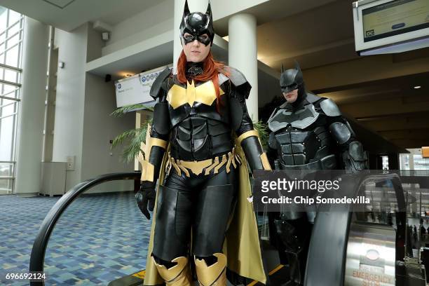 Jessica Jarrett and Duncan Messler of Ignea Cosplay dress as Batwoman and Batman on the first day of Awesome Con at the Walter E. Washington...