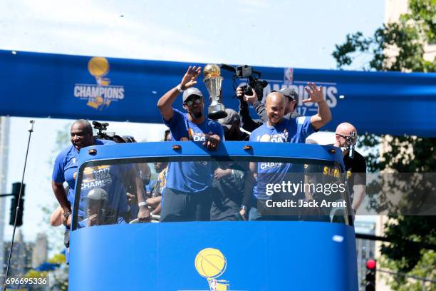 Kevin Durant and David West of the Golden State Warriors celebrates winning the 2017 NBA Championship during a parade on June 15, 2017 in Oakland,...