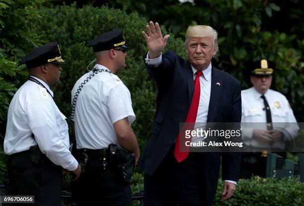 President Donald Trump waves after he landed on the South Lawn June 16, 2017 in Washington, DC. President Trump has returned from Miami, Florida,...