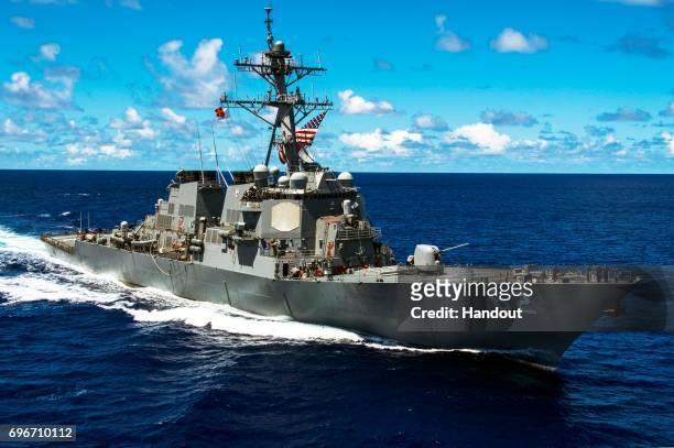 In this handout photo provided by the U.S. Navy, the Arleigh Burke class guided-missile destroyer USS Fitzgerald is on patrol on Sept. 8 in the U.S....