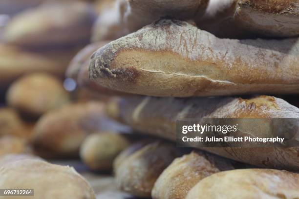 traditional french bread on sale. - chedigny stockfoto's en -beelden