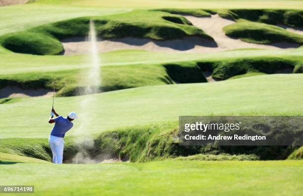 Brooks Koepka of the United States plays his shot on the fourth hole during the second round of the 2017 U.S. Open at Erin Hills on June 16, 2017 in...