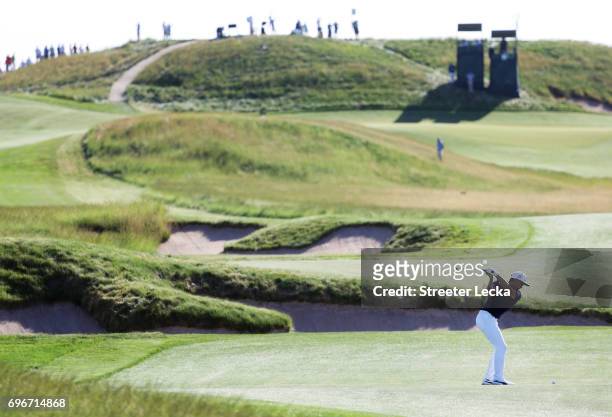 Rickie Fowler of the United States plays his shot on the 14th hole during the second round of the 2017 U.S. Open at Erin Hills on June 16, 2017 in...