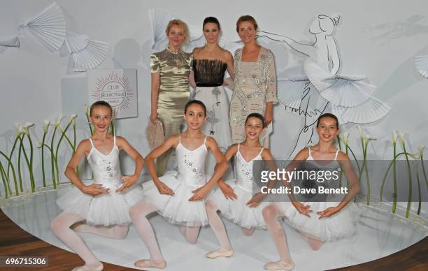 Yulia Polyvoda, Maria Alexandrova and Anna Nasobina pose with ballerinas at a charity gala evening and performance of the play "A Life-Long Pas" in...