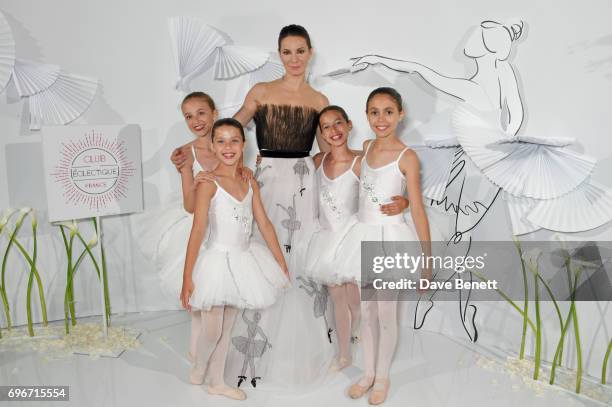 Maria Alexandrova poses with young ballerinas at a charity gala evening and performance of the play "A Life-Long Pas" in honour of Rudolf Nureyev and...