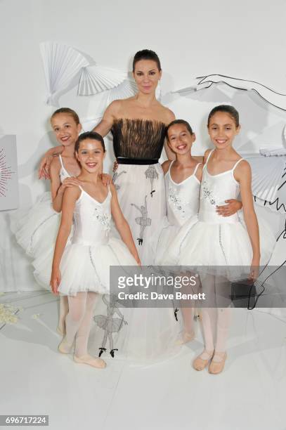 Maria Alexandrova poses with young ballerinas at a charity gala evening and performance of the play "A Life-Long Pas" in honour of Rudolf Nureyev and...