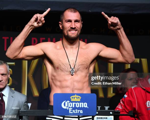 Boxer Sergey Kovalev poses on the scale during his official weigh-in at the Mandalay Bay Events Center on June 16, 2017 in Las Vegas, Nevada. Kovalev...