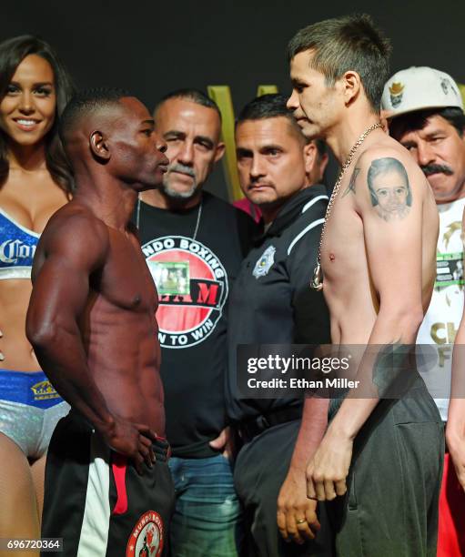 Super bantamweight champion Guillermo Rigondeaux and boxer Moises Flores face off during their official weigh-in at the Mandalay Bay Events Center on...