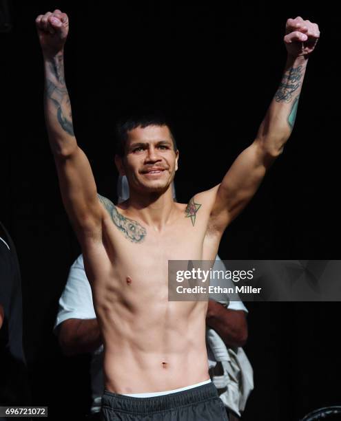 Boxer Moises Flores gestures as he arrives at his official weigh-in at the Mandalay Bay Events Center on June 16, 2017 in Las Vegas, Nevada. Flores...