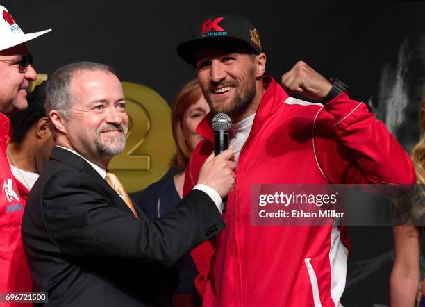 S Kieran Mulvaney interviews boxer Sergey Kovalev after his official weigh-in at the Mandalay Bay Events Center on June 16, 2017 in Las Vegas,...