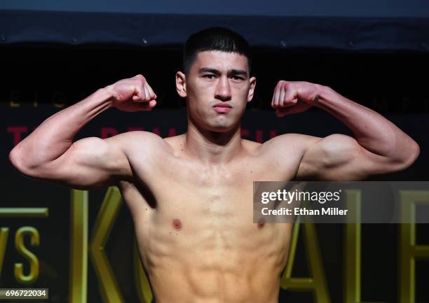Boxer Dmitry Bivol poses on the scale during his official weigh-in at the Mandalay Bay Events Center on June 16, 2017 in Las Vegas, Nevada. Bivol...