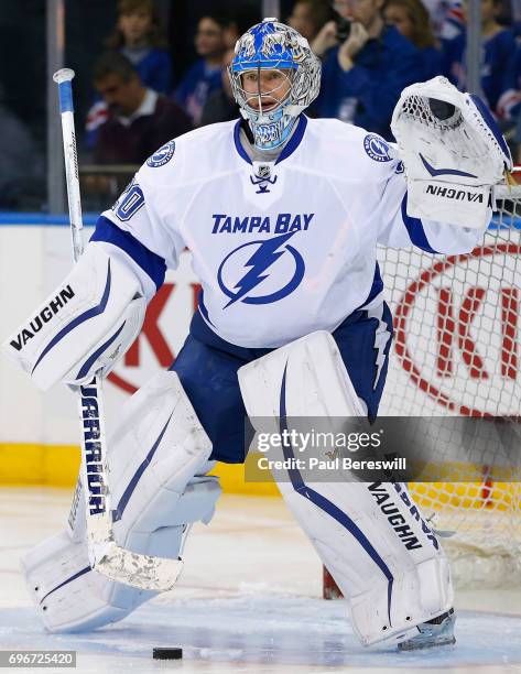 Goaltender Evgeni Nabokov of the Tampa Bay Lightning warms up before playing in the game against the New York Rangers at Madison Square Garden on...