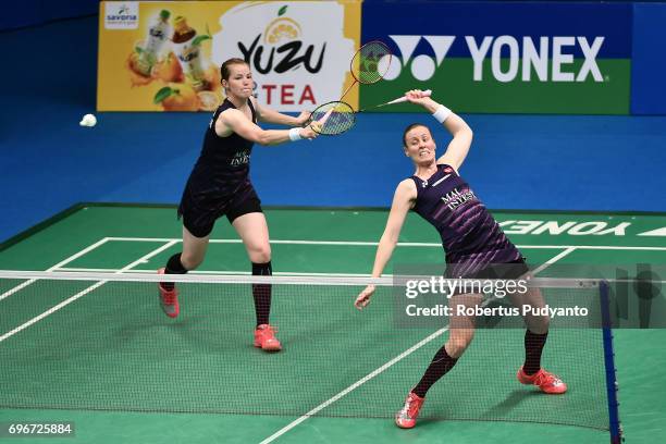 Kamilla Rytter Juhl and Christinna Pedersen of Denmark compete against Chen Qingchen and Jia Yifan of China during Womens Double Quarterfinal match...