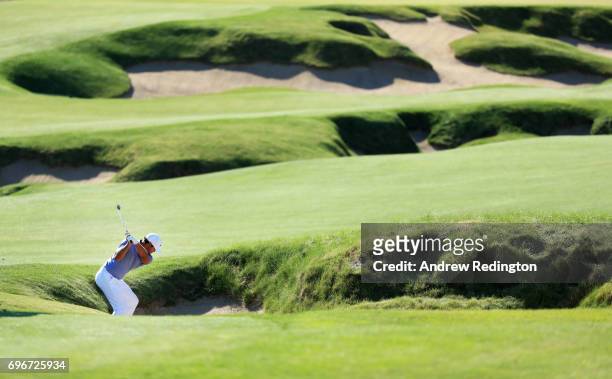 Brooks Koepka of the United States plays his shot on the fourth hole during the second round of the 2017 U.S. Open at Erin Hills on June 16, 2017 in...