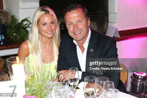Vanessa Lisa Grobe and Norbert Dobeleit during the 2nd I'm Living Charity Golf Cup at Golfclub Beuerberg on June 16, 2017 in Penzberg, Germany. The...