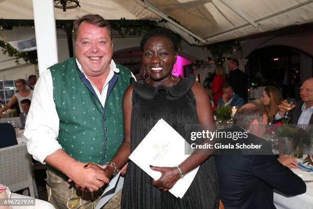 Harald "Harry" Mueller, PASCHA Cologne, purchase by auction a dirndl and makes it Dr. Auma Obama, sister of Barack Obama as a present during the 2nd...