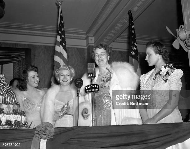 Highlights of the President's birthday celebration in Washington was cutting of the giant cake by Mrs. Franklin D. Roosevelt. Left to right: Lana...