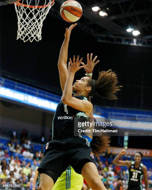 Nayo Raincock-Ekunwe of the New York Liberty dunks against the Dallas Wings on June 16, 2017 at College Park Center in Arlington, Texas. NOTE TO...