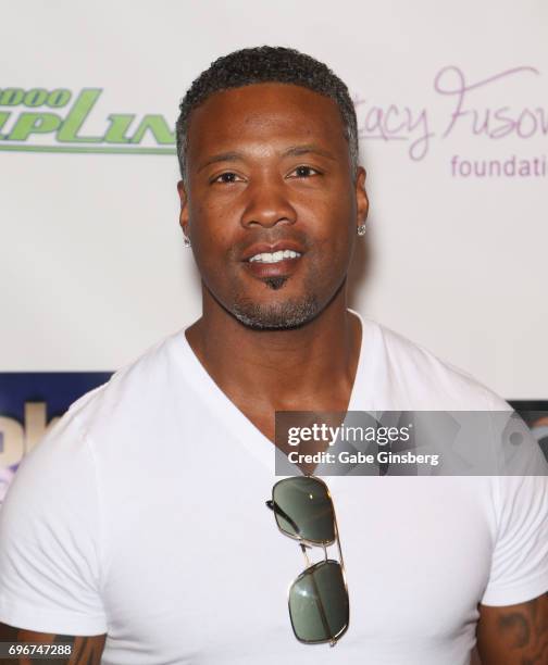 Former NFL player Lawyer Milloy attends the Raising the Stakes Celebrity Charity Poker Tournament benefiting the One Step Closer Foundation at Planet...