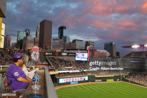 Omarr Baker helps celebrate "Prince Night" at Target Field, a tribute to Minneapolis' own late musician organized by home team Minnesota Twins on...