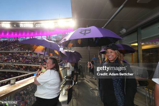 Norrine Nelson helps celebrate "Prince Night" at Target Field, a tribute to Minneapolis' own late musician organized by home team Minnesota Twins on...