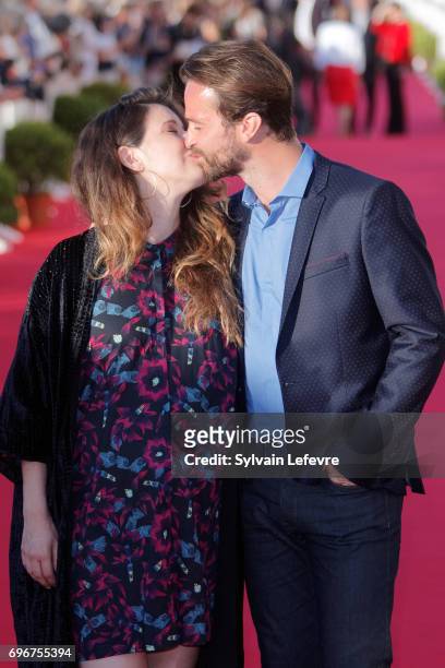 Amaury de Crayencour and his wife attend red carpet of 3rd day of the 31st Cabourg Film Festival on June 16, 2017 in Cabourg, France.