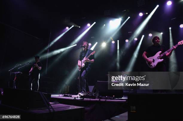 Tim Nordwind, Damian Kulash, and Andy Ross of OK GO perform onstage during the 2017 Firefly Music Festival on June 16, 2017 in Dover, Delaware.